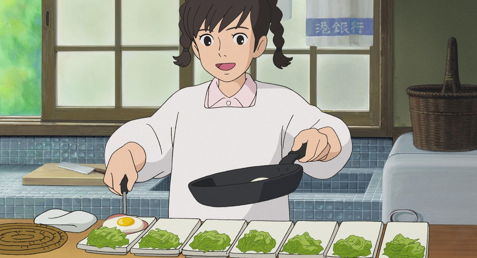 Umi prepara el desayuno de la pensión