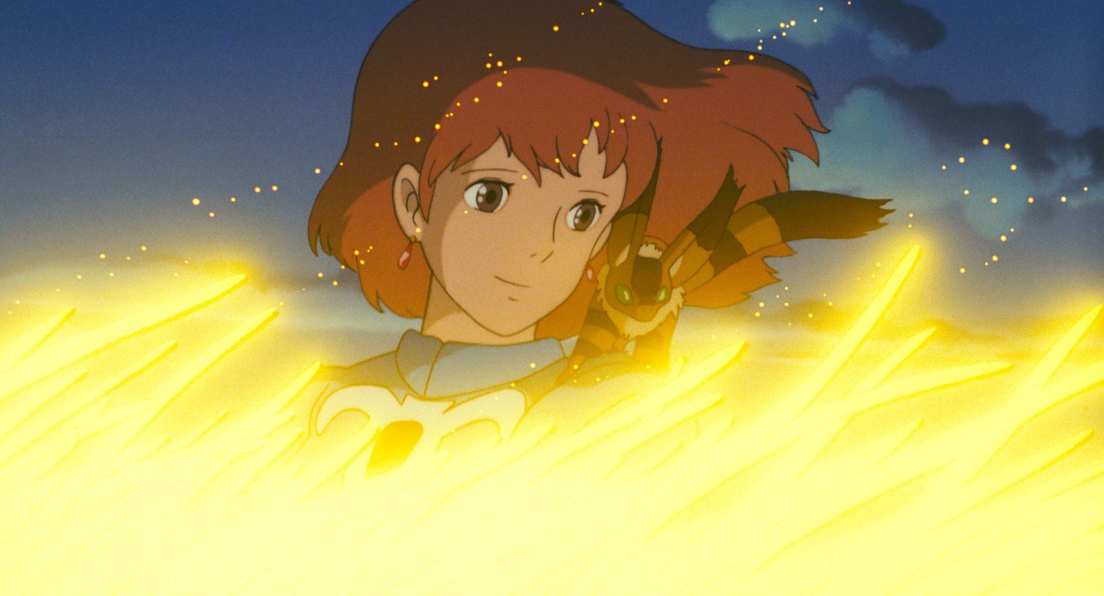 Nausicaä, de azul, sobre las antenas doradas de los Ohmu