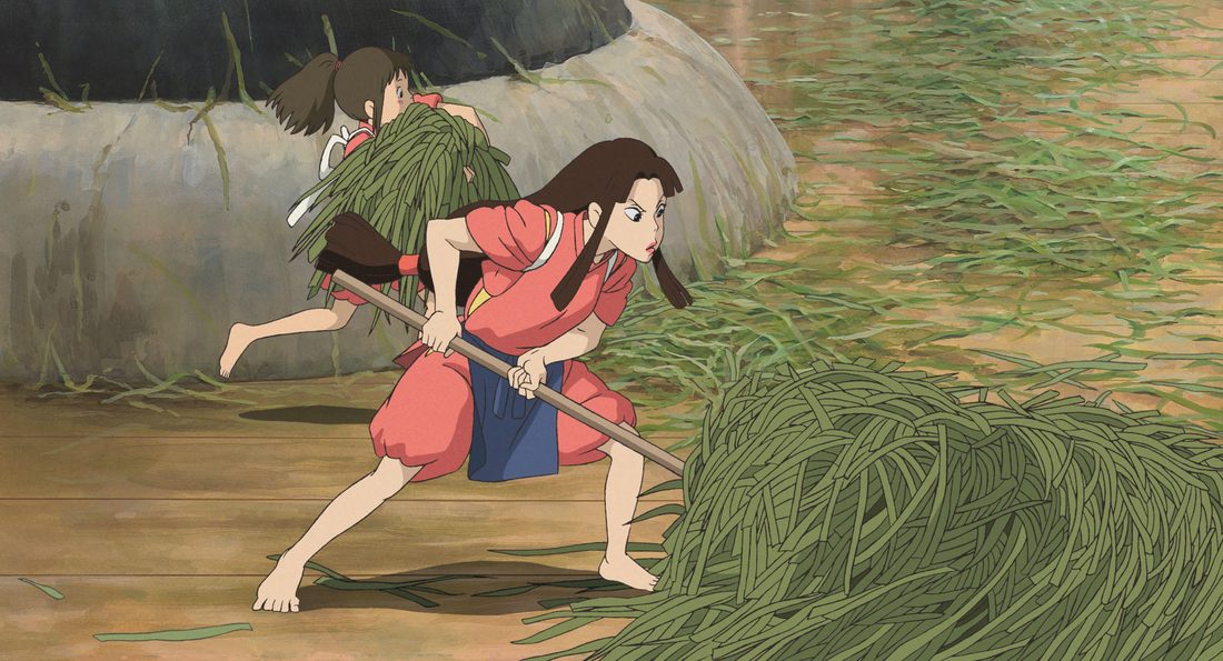 Lin acarrea un haz de hierba junto a Chihiro