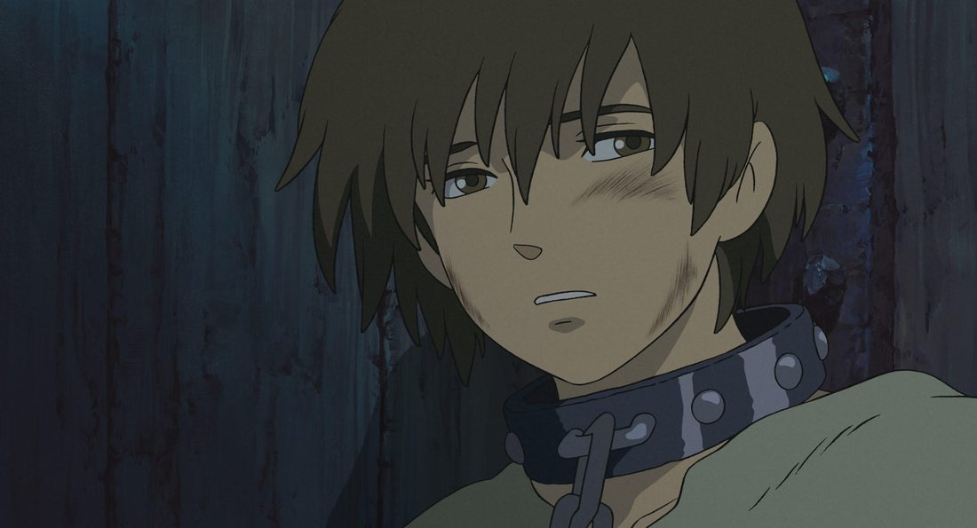 Arren en la penumbra, con el collar de esclavo puesto