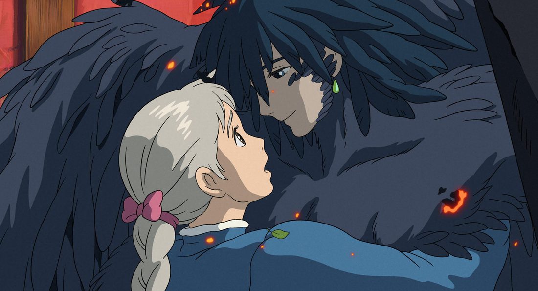 Howl a medio transformar, sujetando a Sophie entre las plumas negras
