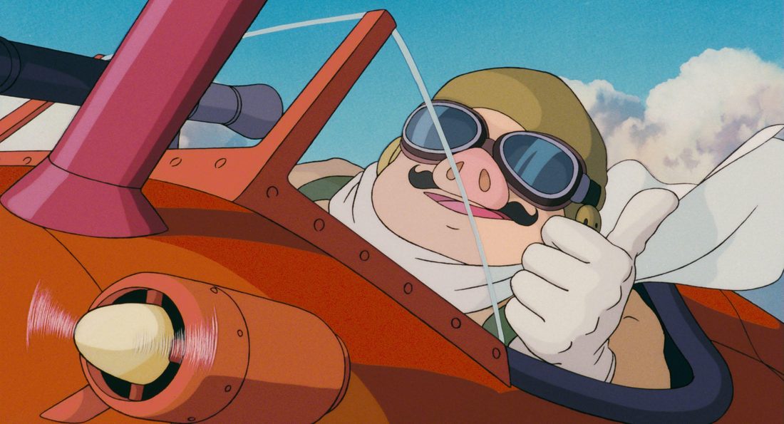 A los mandos del Savoia rojo, con las gafas puestas