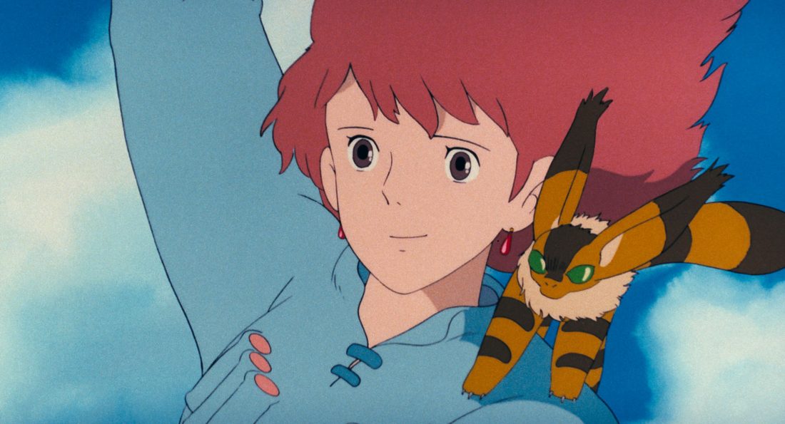 Teto agarrado al hombro de Nausicaä en pleno vuelo
