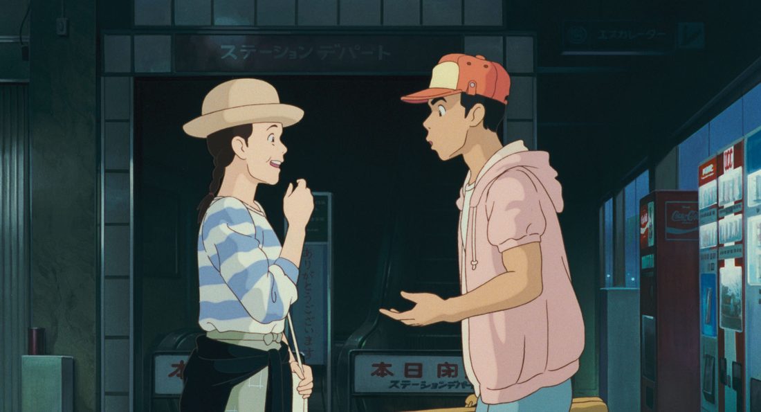 Toshio habla con Taeko, de noche, delante de la tienda