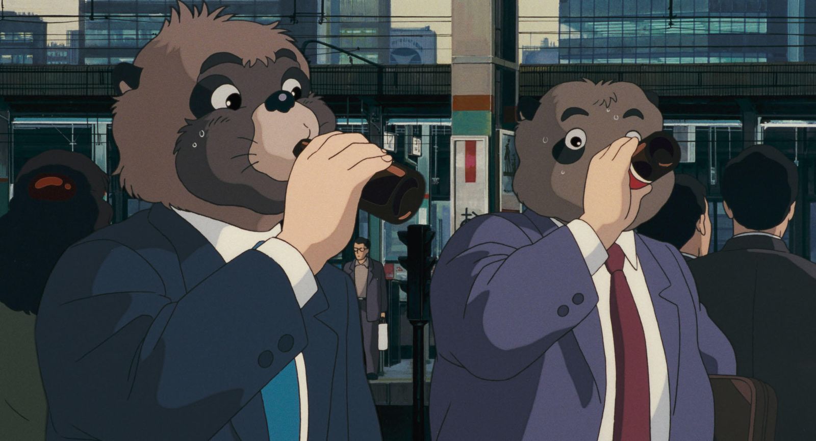 Dos tanuki convertidos en oficinistas